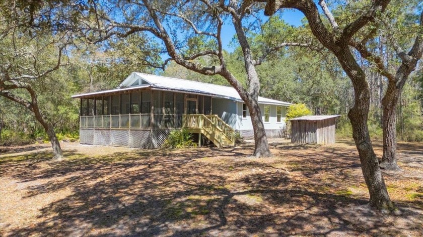 Privacy Plus on the Sopchoppy River. Situated on 3 lots with 1 - Beach Home for sale in Sopchoppy, Florida on Beachhouse.com