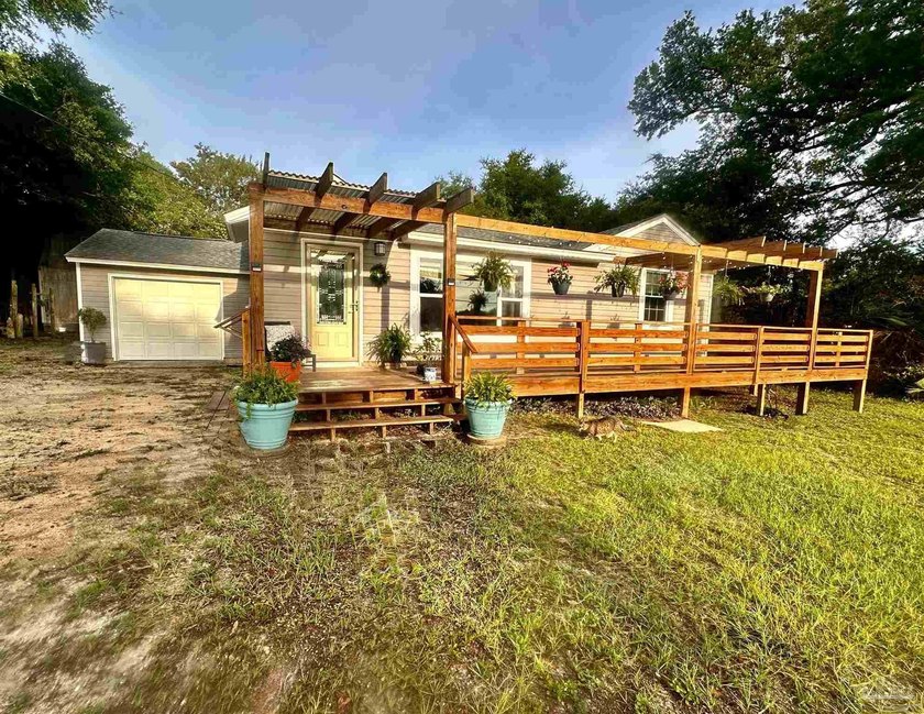 A STUNNING turn-key, open-concept remodeled home with an - Beach Home for sale in Pensacola, Florida on Beachhouse.com