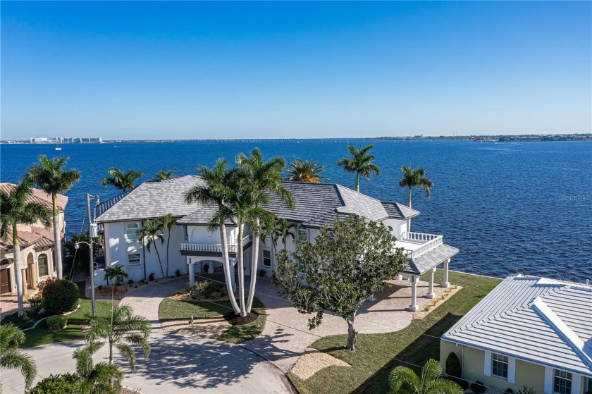 ONE-OF-A-KIND, THREE-STORY, HARBORFRONT HOME W/234 FT OF SEAWALL - Beach Home for sale in Punta Gorda, Florida on Beachhouse.com