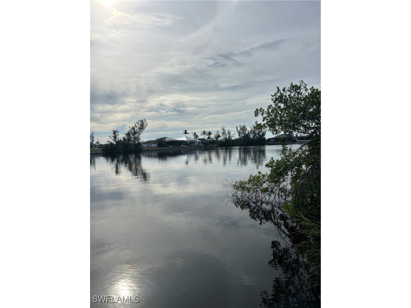 Come check out this beautiful oversized gulf access lot with SE - Beach Lot for sale in Cape Coral, Florida on Beachhouse.com