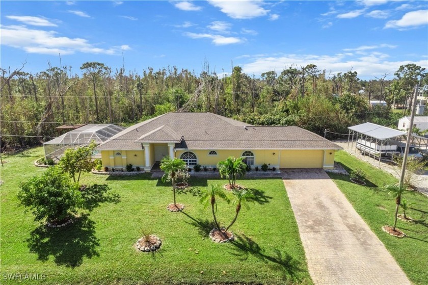 Stunning Pool Home near Tarpon Lodge and the Alden Pines Golf - Beach Home for sale in Bokeelia, Florida on Beachhouse.com