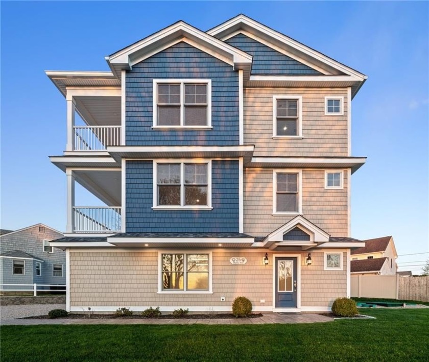 Get ready to fall in love with this sunny island stunner! Bathed - Beach Home for sale in Narragansett, Rhode Island on Beachhouse.com