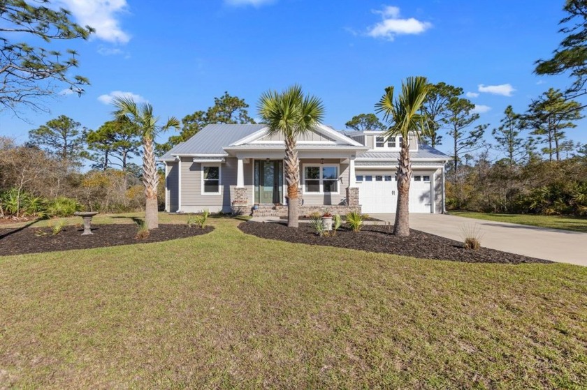 Experience the best of coastal living in this impeccable fully - Beach Home for sale in Carabelle, Florida on Beachhouse.com