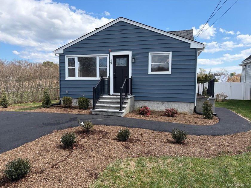Beautifully remodeled 3 bedroom, 1 bath waterfront home set on a - Beach Home for sale in Shirley, New York on Beachhouse.com