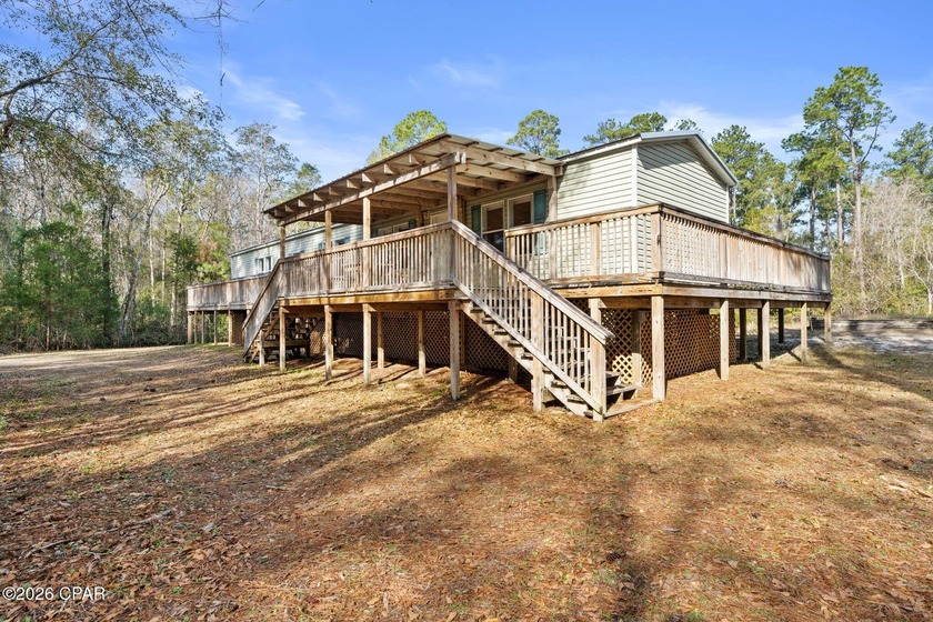 Welcome to 6919 Nellie Whitfield Rd in Wewahitchka - a property - Beach Home for sale in Wewahitchka, Florida on Beachhouse.com