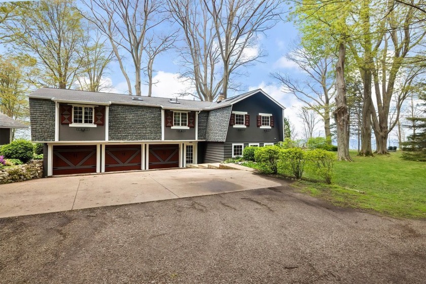 Nestled on the tranquil shores of Lake Erie, this 4-bedroom - Beach Home for sale in Lake City, Pennsylvania on Beachhouse.com