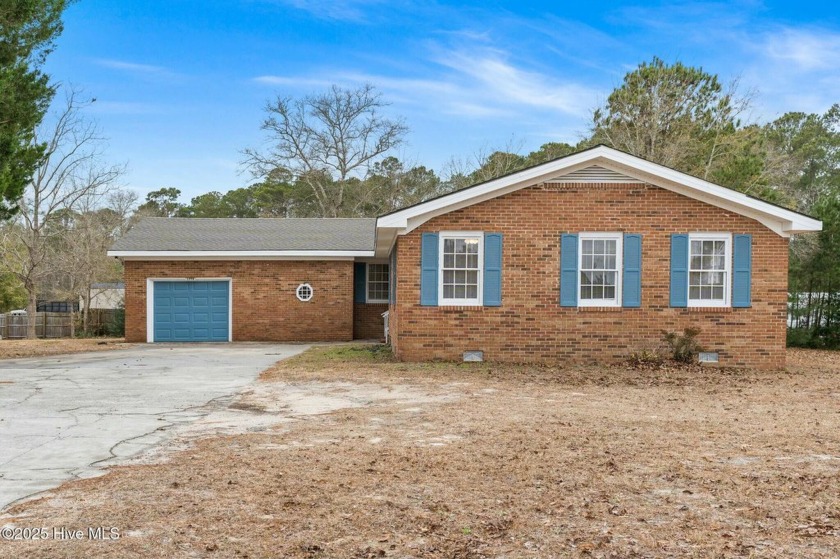 Discover this beautifully updated four bedroom 2.5 bath brick - Beach Home for sale in Supply, North Carolina on Beachhouse.com