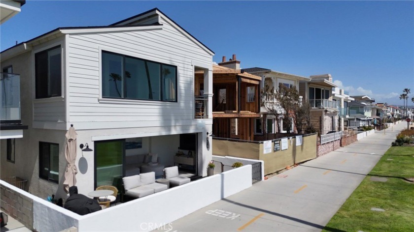 Discover the coastal dream at 916 E Oceanfront--a rare and - Beach Townhome/Townhouse for sale in Newport Beach, California on Beachhouse.com