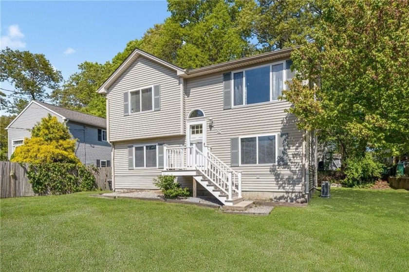 Welcome to 67 Meadowrue Trail, a charming 3-bedroom, 2-bath home - Beach Home for sale in Narragansett, Rhode Island on Beachhouse.com