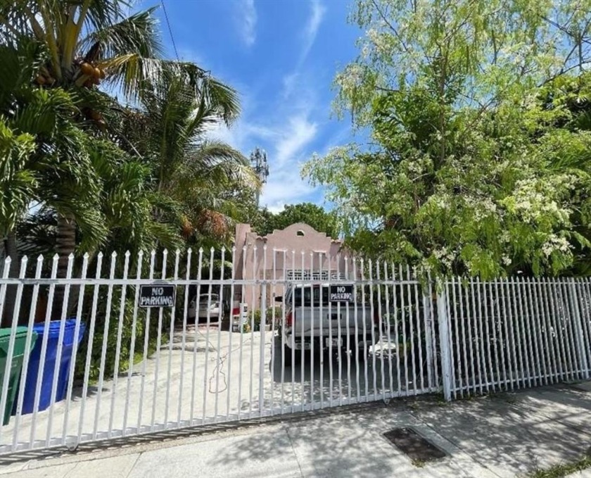 This rare find includes a single-family home with two detached - Beach Lot for sale in Miami, Florida on Beachhouse.com