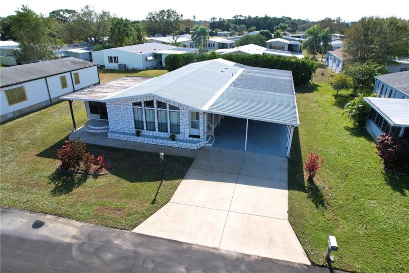 Located in the sought-after Haven Green section of Barefoot Bay - Beach Home for sale in Barefoot Bay, Florida on Beachhouse.com