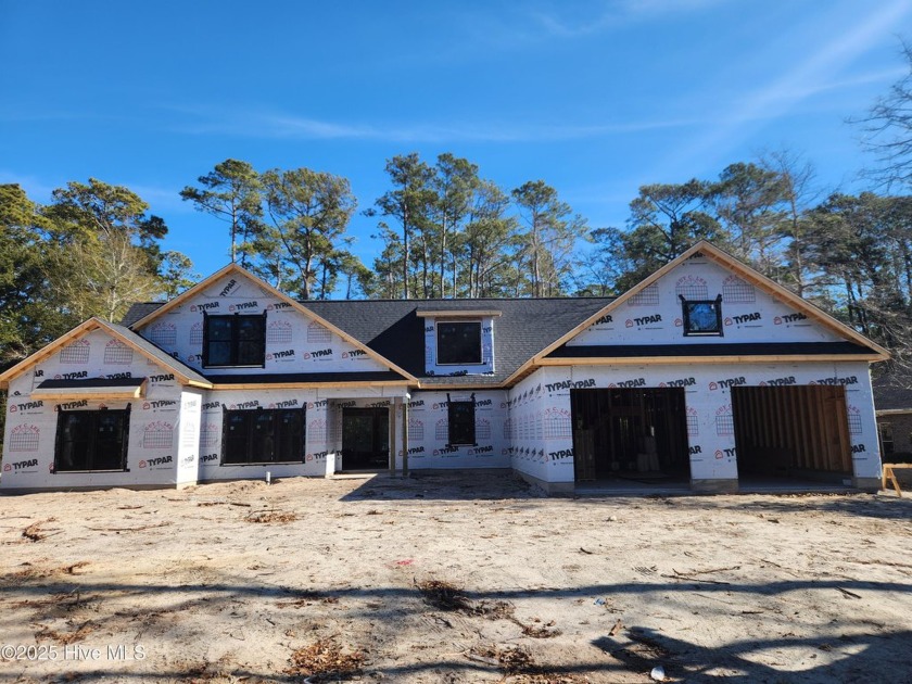 Custom designed home in the Lake Forest section of Brick Landing - Beach Home for sale in Ocean Isle Beach, North Carolina on Beachhouse.com