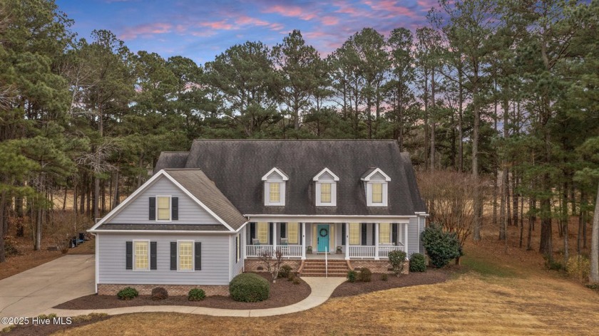 Nestled on the 12th fairway of a premier gated waterfront golf - Beach Home for sale in Hertford, North Carolina on Beachhouse.com