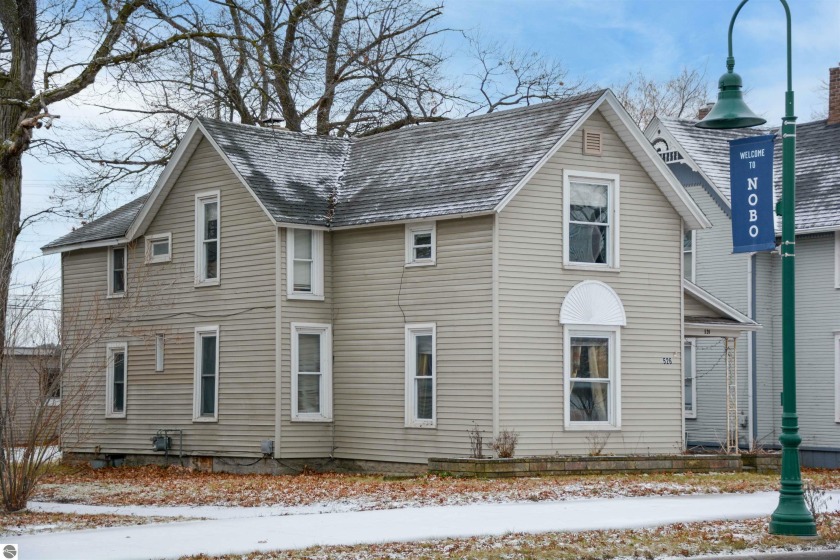 Excellent income opportunity in downtown Traverse City. Located - Beach Home for sale in Traverse City, Michigan on Beachhouse.com