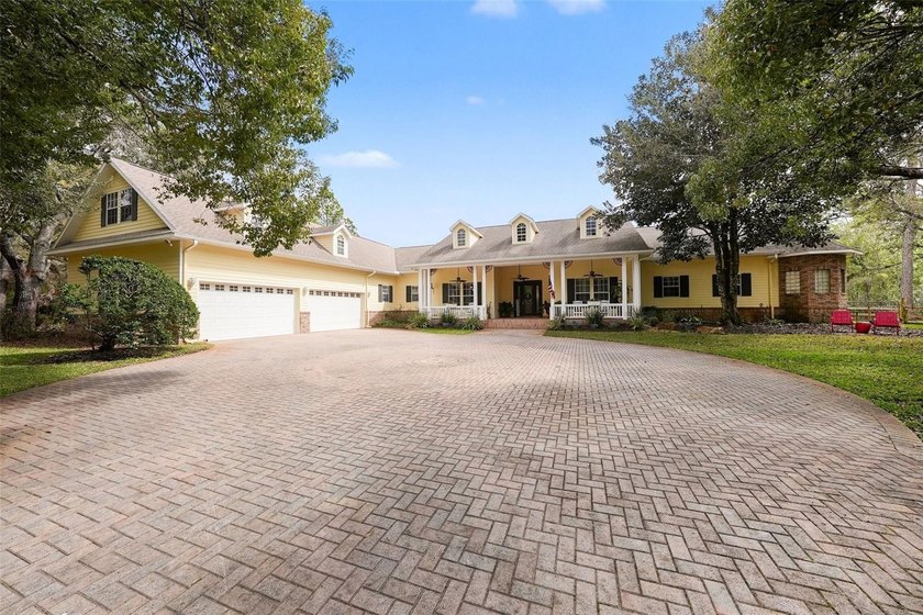 Welcome to this serene equestrian estate with a private gated - Beach Home for sale in New Port Richey, Florida on Beachhouse.com