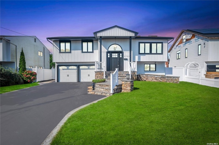 Discover this stunning High Ranch home in Bellmore, where style - Beach Home for sale in Bellmore, New York on Beachhouse.com