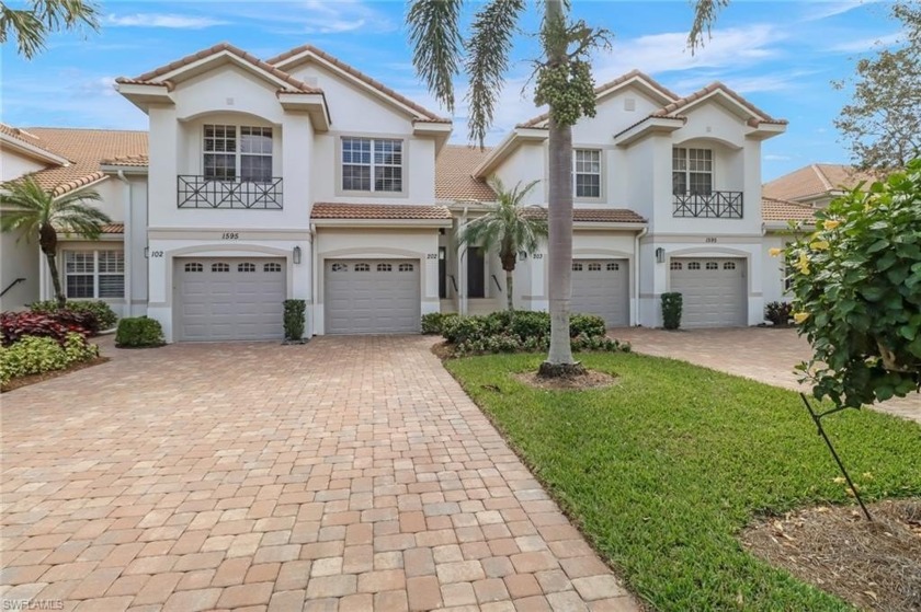 Nicely refreshed top floor coach home with single car garage in - Beach Home for sale in Naples, Florida on Beachhouse.com