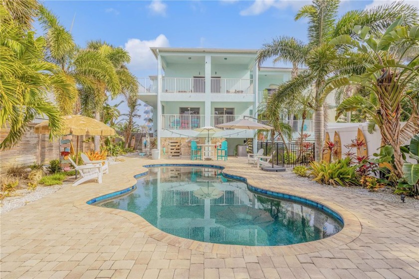 Welcome to this stunning 3-bedroom, 2-bathroom home, perfectly - Beach Home for sale in New Smyrna Beach, Florida on Beachhouse.com