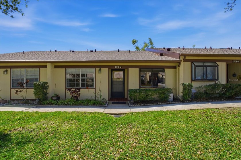 Welcome to Timber Oaks at Dollar Lake, a sought-after 55+ active - Beach Condo for sale in Port Richey, Florida on Beachhouse.com