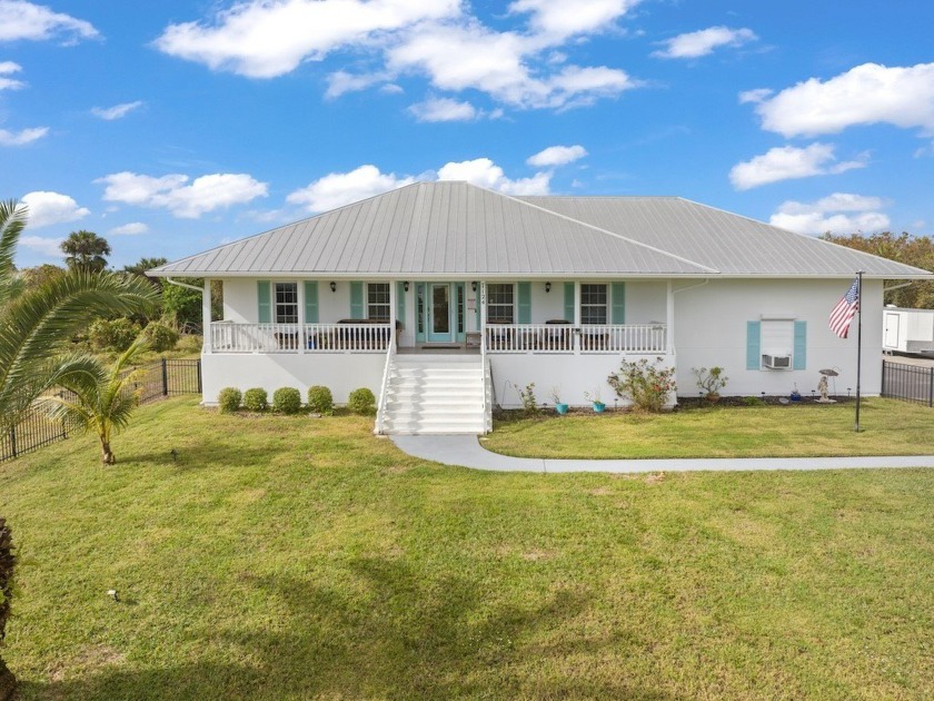 Custom Home with River Views! NO HOA and covered parking for the - Beach Home for sale in Grant Valkaria, Florida on Beachhouse.com