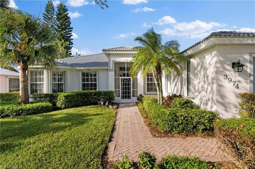 This exquisite lakefront residence in Forest Park redefines - Beach Home for sale in Naples, Florida on Beachhouse.com