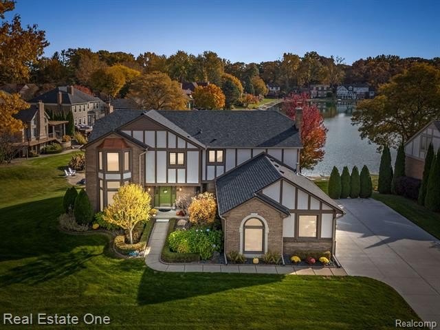 Sherwood Forest Lake Front! Impressive brick, colonial home- - Beach Home for sale in Shelby, Michigan on Beachhouse.com