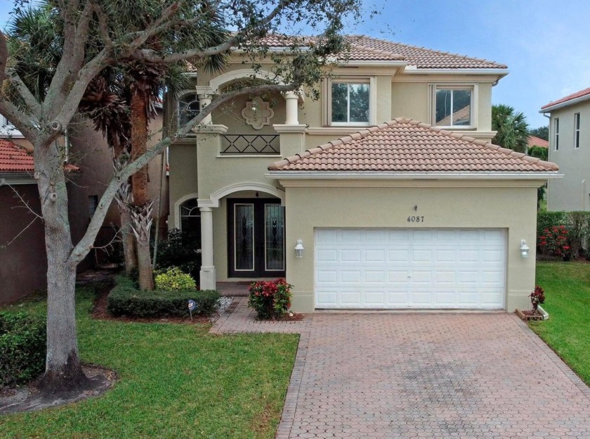 Lakefront Living at Its Best in Palmyra Estates! This - Beach Home for sale in Boynton Beach, Florida on Beachhouse.com