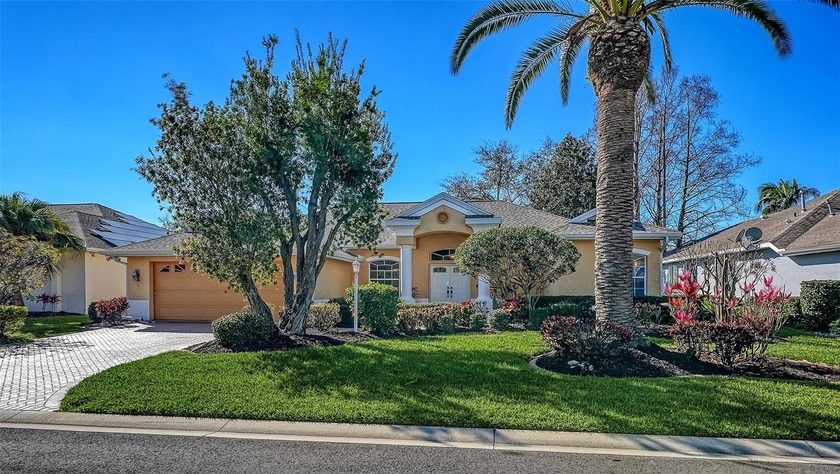 Welcome to 5566 Magnolia Tree Terrace, nestled in the charming - Beach Home for sale in Sarasota, Florida on Beachhouse.com