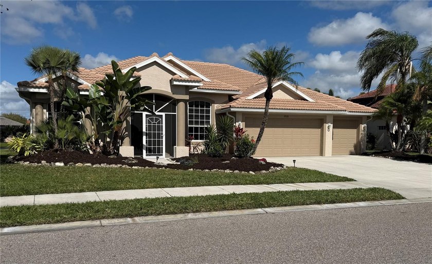 Discover this lakefront pool home in the gated community of - Beach Home for sale in Sarasota, Florida on Beachhouse.com