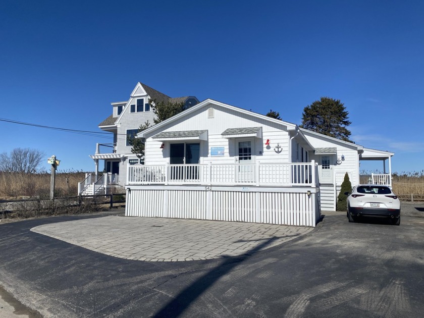 Beyond the breathtaking location, this duplex presents an - Beach Lot for sale in Wells, Maine on Beachhouse.com