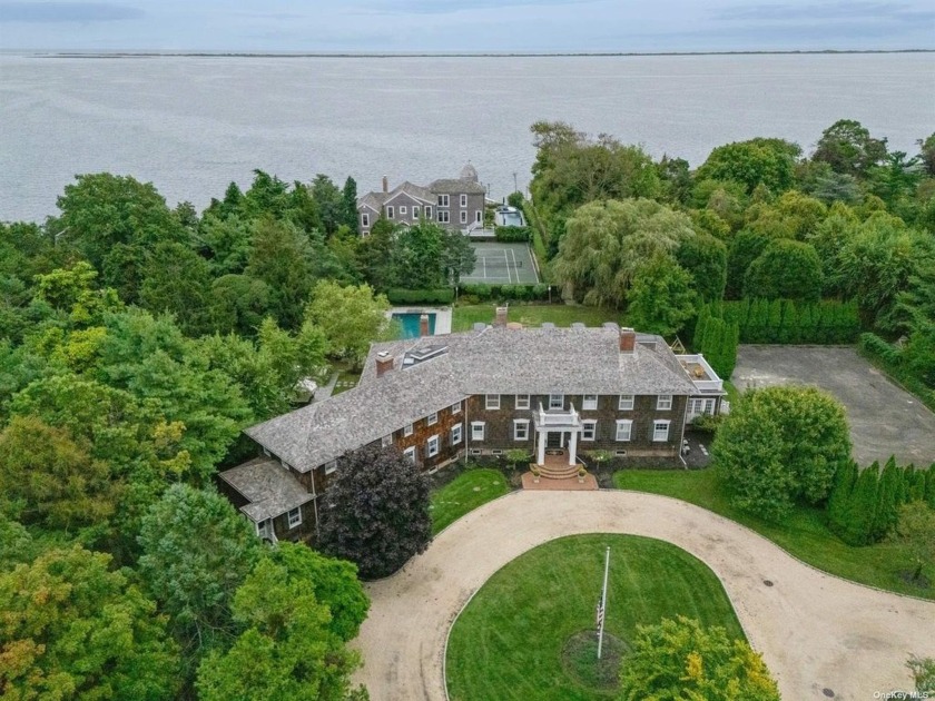 Offered, a breathtaking estate that combines the elegance of its - Beach Home for sale in Bellport, New York on Beachhouse.com