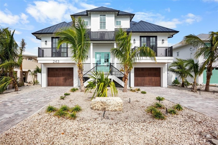 This almost brand-new, (2024) fully furnished 4-bedroom, 4 - Beach Home for sale in Holmes Beach, Florida on Beachhouse.com