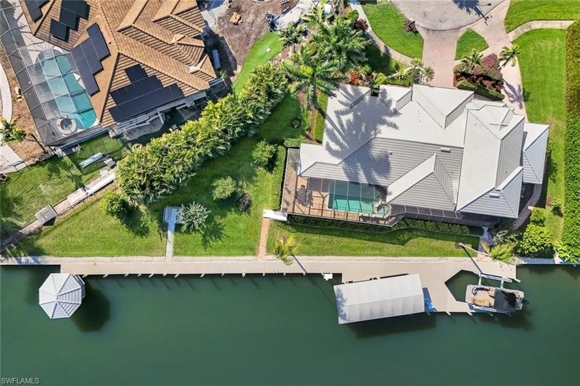 Experience premier waterfront living with this distinguished - Beach Home for sale in Marco Island, Florida on Beachhouse.com