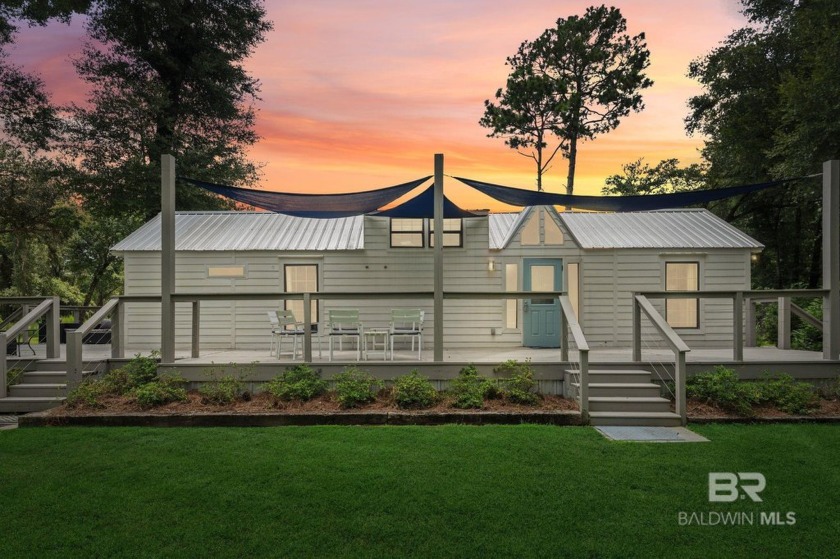 Discover your one-of-a-kind Gulf Shores getaway! This furnished - Beach Home for sale in Gulf Shores, Alabama on Beachhouse.com