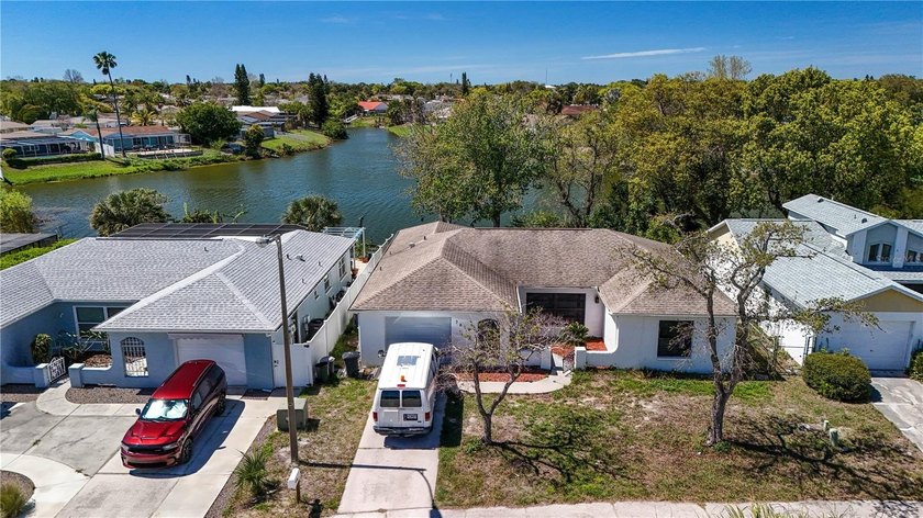 LAKEFRONT!!  TWO BEDROOM, TWO BATH, EL DORADO STYLE HOME - Beach Home for sale in Port Richey, Florida on Beachhouse.com