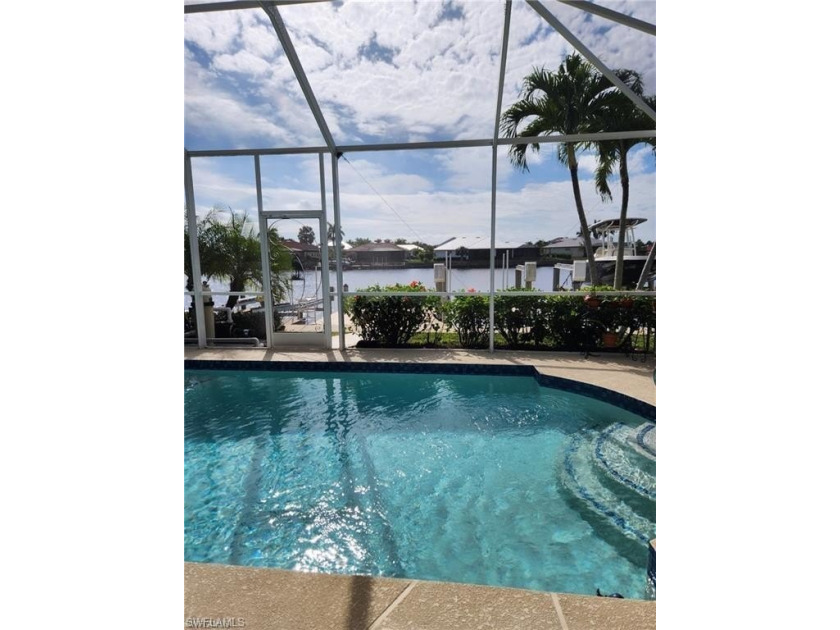 This stunning waterfront villa in Naples, Port of the Islands is - Beach Home for sale in Naples, Florida on Beachhouse.com