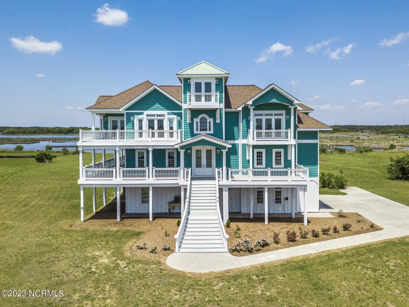 This exceptional private waterfront estate defines elegance - Beach Home for sale in North Topsail Beach, North Carolina on Beachhouse.com