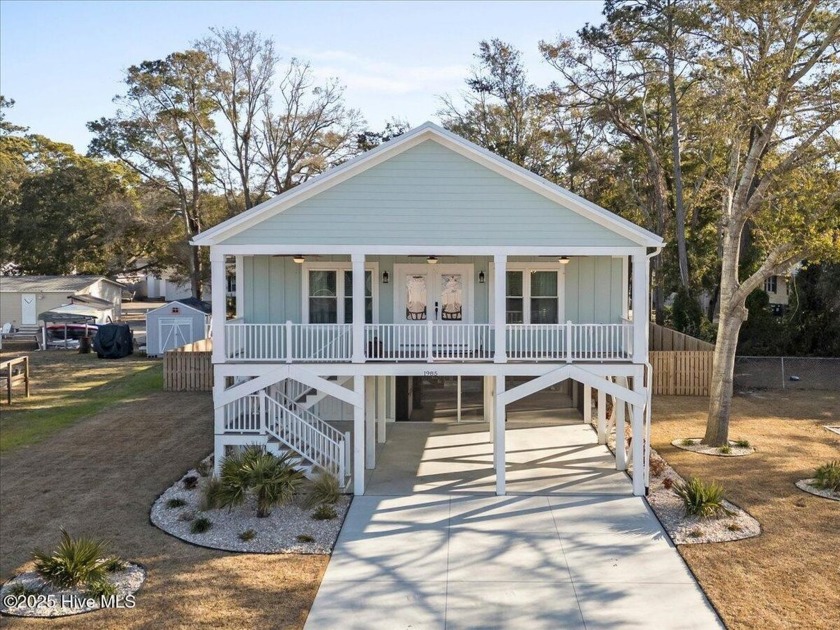 Welcome to your luxury coastal retreat! This rare gem is ideally - Beach Home for sale in Ocean Isle Beach, North Carolina on Beachhouse.com