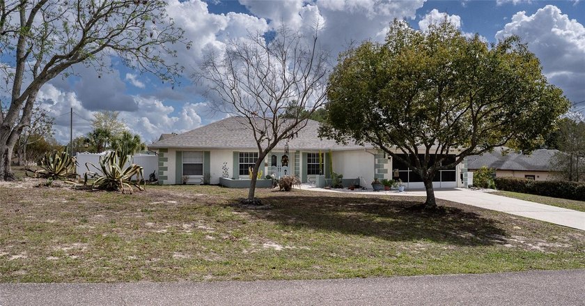 Look no more!  This 3 bedroom, 3 bath, 2 car garage, pool home - Beach Home for sale in Spring Hill, Florida on Beachhouse.com