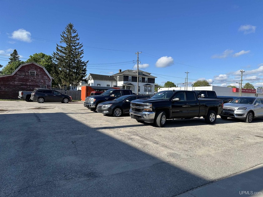 High-Traffic Corner Lot in the Heart of Downtown Manistique - - Beach Lot for sale in Manistique, Michigan on Beachhouse.com