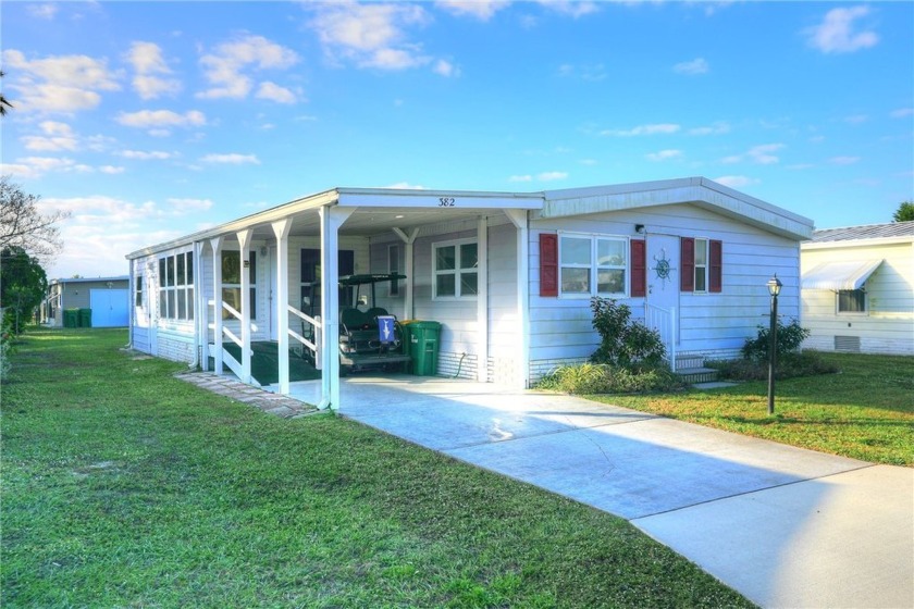 Turnkey 2/2 home in Barefoot Bay with stunning lake views! Enjoy - Beach Home for sale in Sebastian, Florida on Beachhouse.com