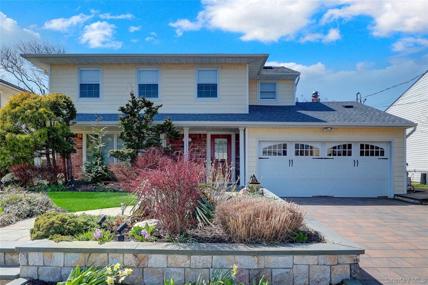 Welcome to this beautifully updated 4 bedroom, 2.5 bath Colonial - Beach Home for sale in Lido Beach, New York on Beachhouse.com