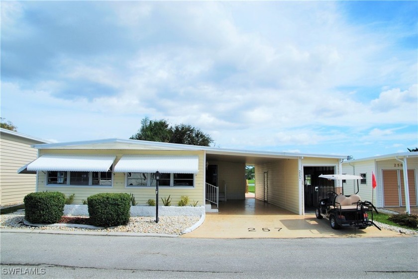 Ideally positioned on a premium golf course lot with - Beach Home for sale in North Fort Myers, Florida on Beachhouse.com