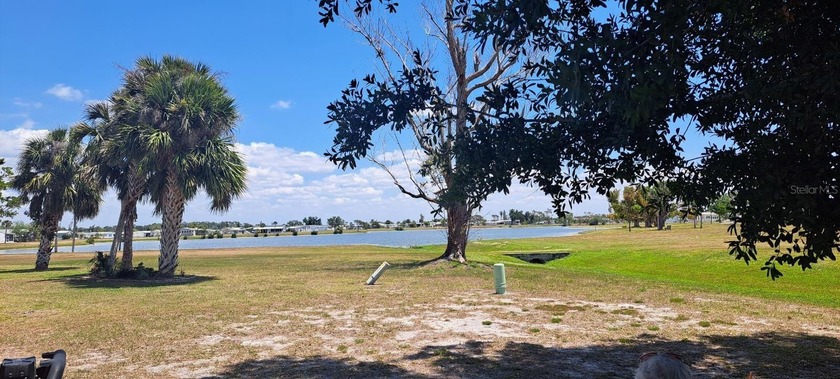 Serenity Awaits with Stunning Lake & Greenbelt Views! Relax and - Beach Lot for sale in Port Charlotte, Florida on Beachhouse.com