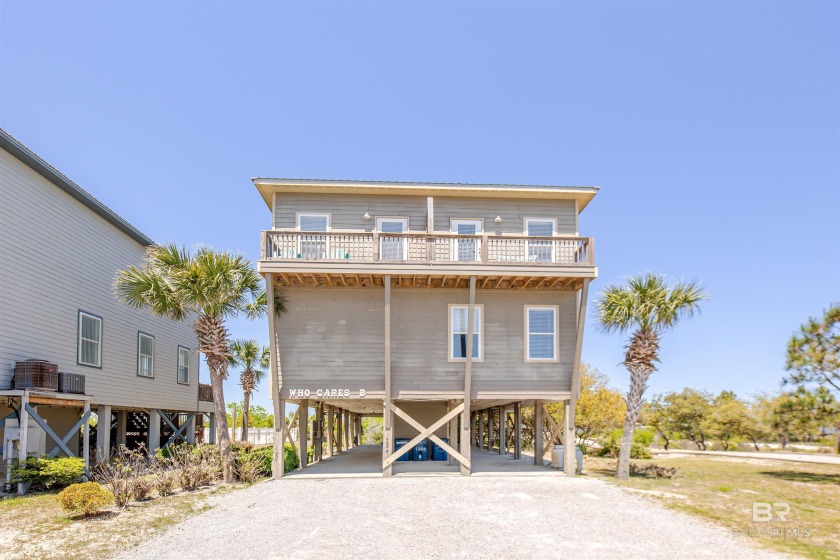 The perfect setting with remarkable sunsets on Little Lagoon - Beach Condo for sale in Gulf Shores, Alabama on Beachhouse.com