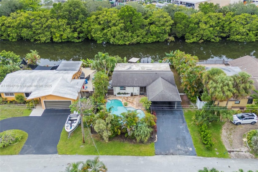 Discover your private tropical sanctuary in this stunning - Beach Home for sale in Oakland Park, Florida on Beachhouse.com