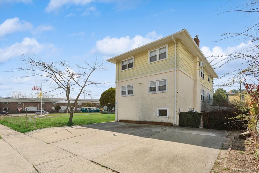Welcome to 31 Julian Place, A Fully Renovated Legal 2-Family in - Beach Home for sale in Island Park, New York on Beachhouse.com