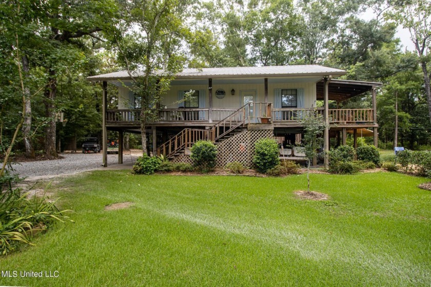 Piece of Paradise on the Biloxi River! This unique and beautiful - Beach Home for sale in Gulfport, Mississippi on Beachhouse.com