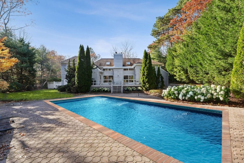 Nestled on a serene and private .92-acre lot, this turnkey - Beach Home for sale in Hampton Bays, New York on Beachhouse.com