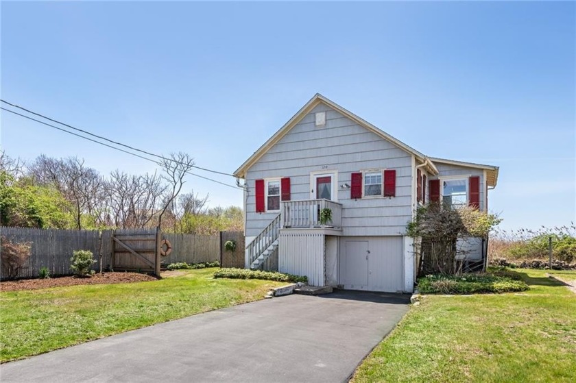This quintessential wood shingle summer cottage stands as a - Beach Home for sale in Narragansett, Rhode Island on Beachhouse.com